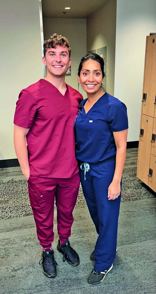 Colton Gruhler, Class of 2024, with Dr. Aisha Ami, dental director of CommuniCare+OLE