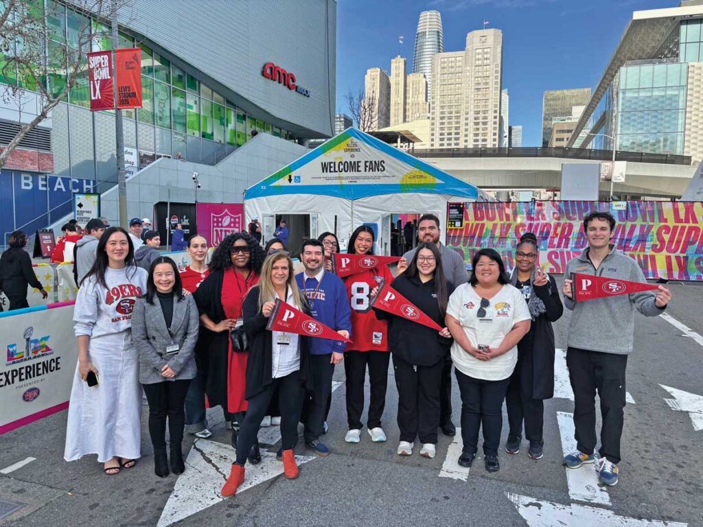 Dugoni School group photo at the Superbowl Experience at Moscone Center