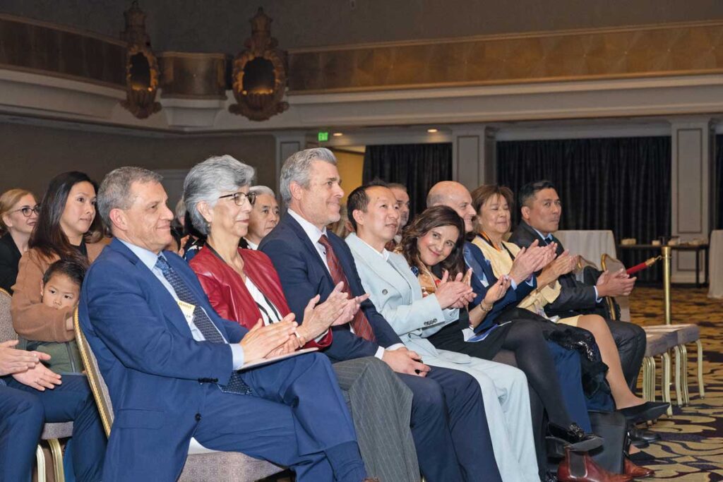Elena Francisco and others in audience