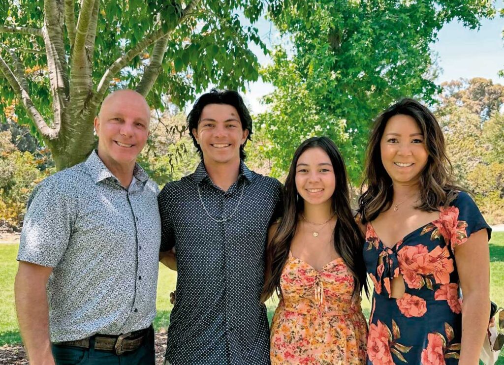 Diana Fat poses with her family